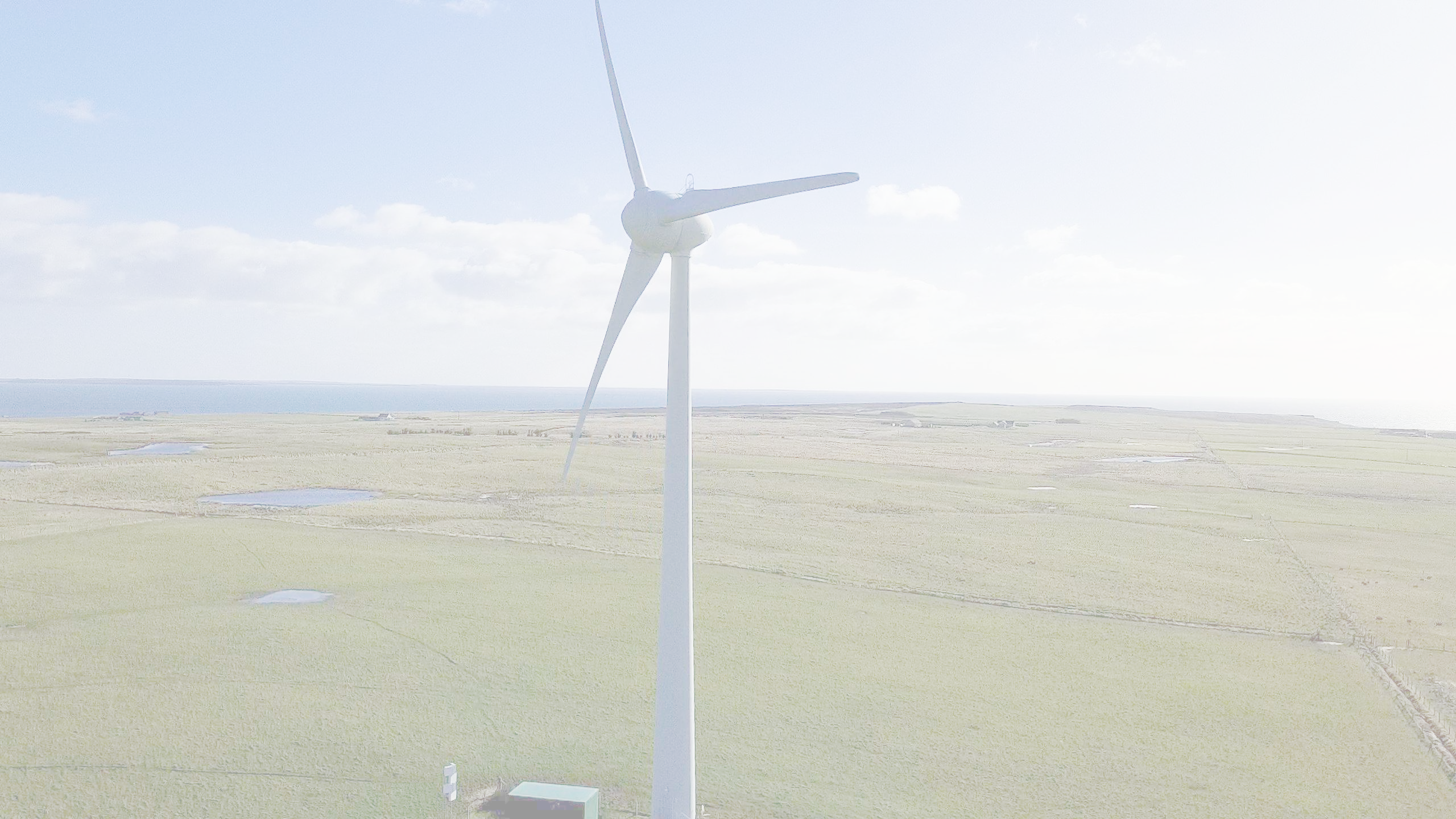Wind turbine in countryside landscape